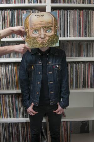 Joseph A. Gervasi, Gentle Giant, before a section of his personal record collection